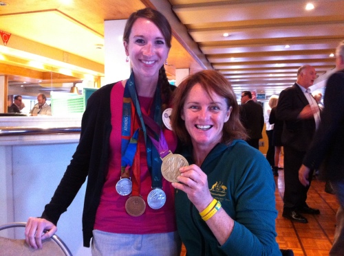 Wearing four Olympic medals. No big deal. Or a VERY cool deal!